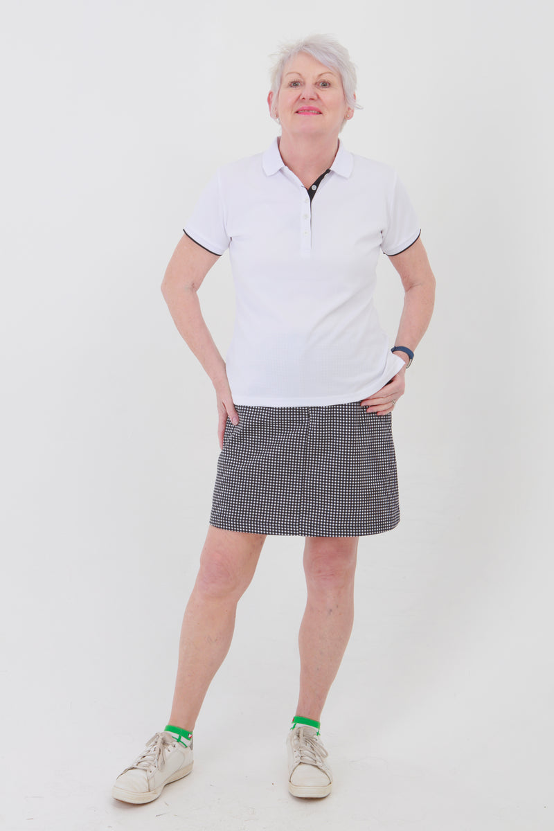 The gingham collection is a winner for lady golfers around the world.  This golfing skirt is similar to a golfing skort but has comfortable inbuilt pants. With the plain pique lady golfer polo tops you will be ready to hit the catwalks as well as the golf courses. Women golfers will love this for their daily sports.